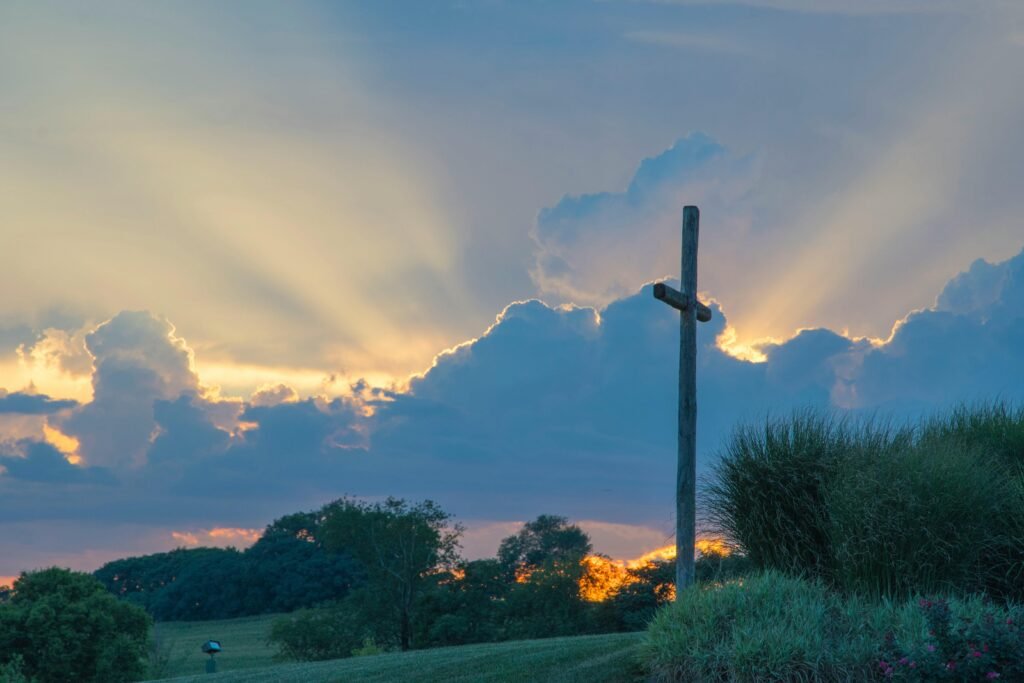 Beautiful sunset with wooden cross in a serene landscape of Frederick, MD, USA.